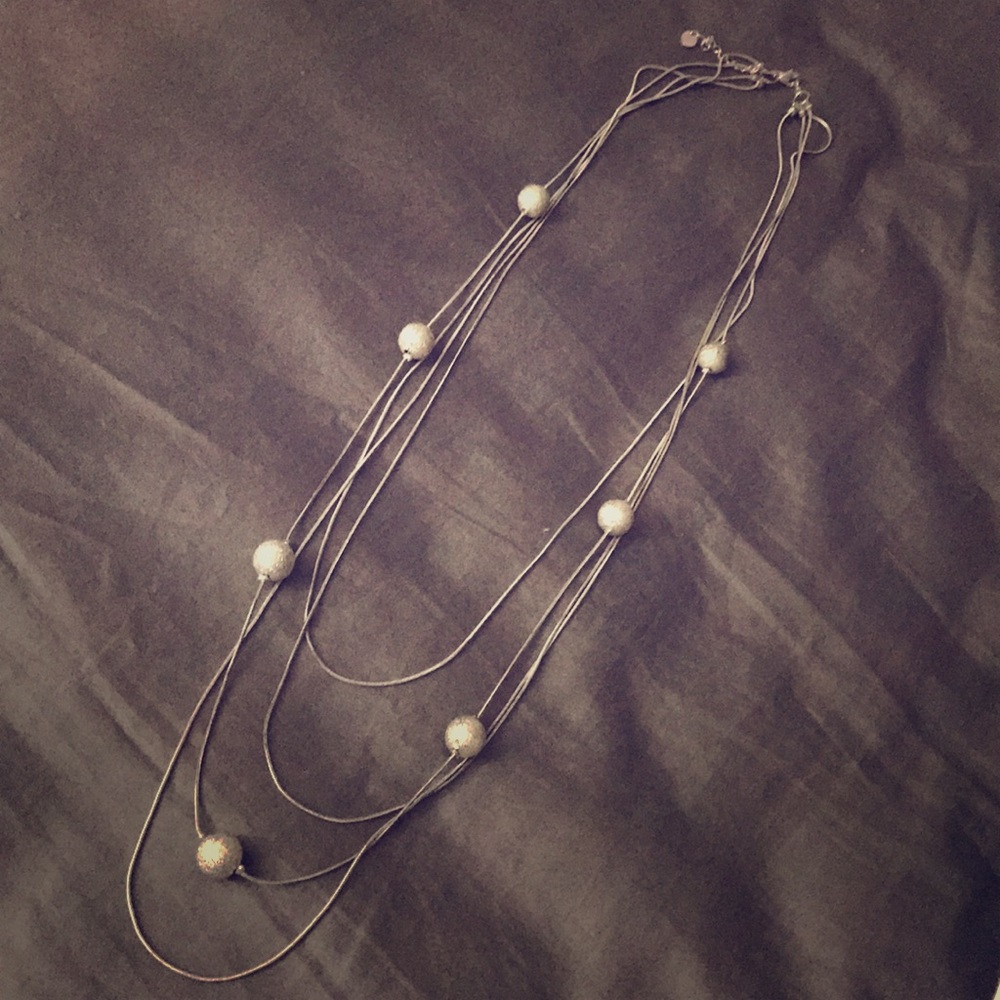 Long fashion statement silver necklace